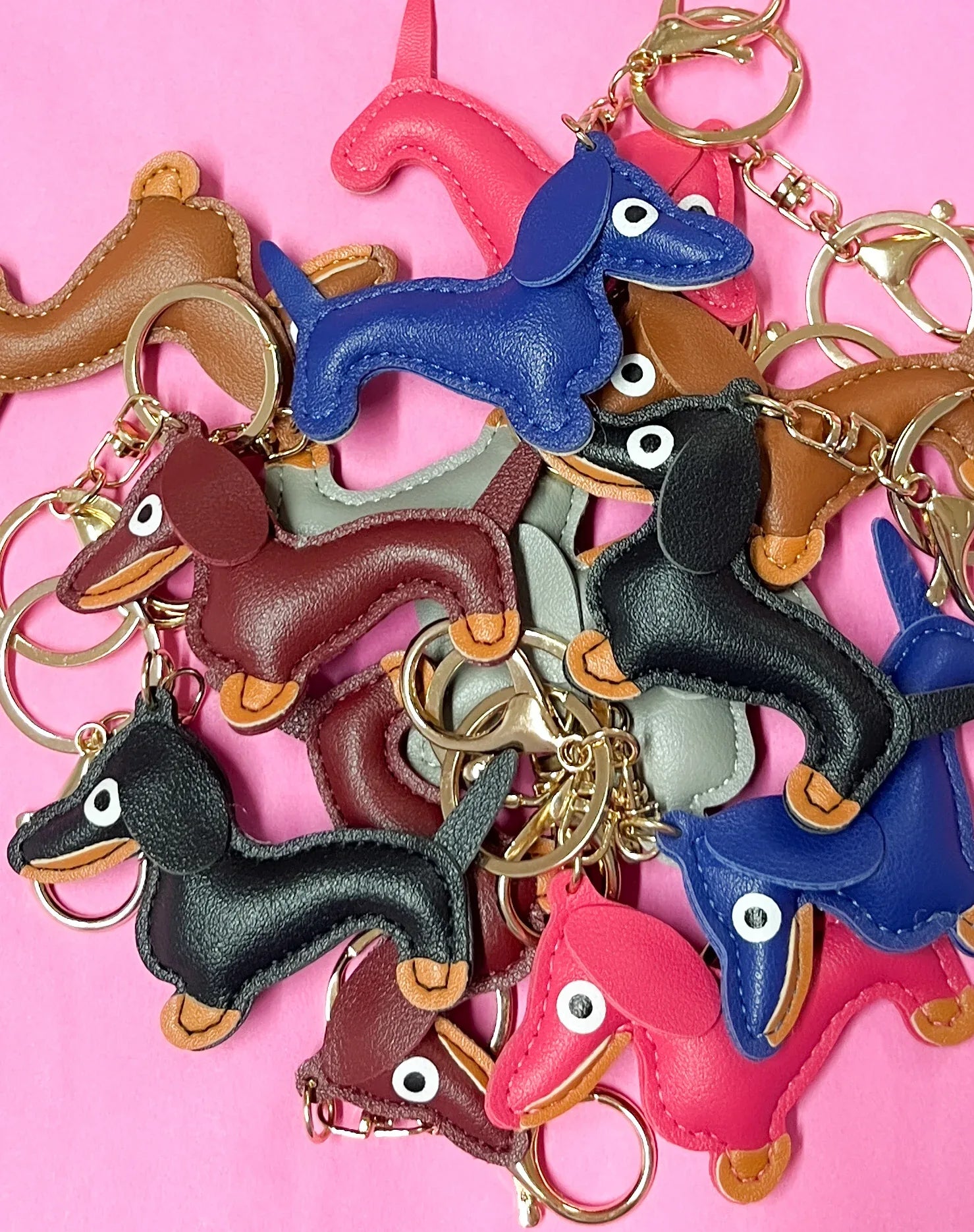 Produktfoto vom Schlüsselanhänger mit allen Dackel Motiven Farbe vom Hamburger Modelabel stegmann mode