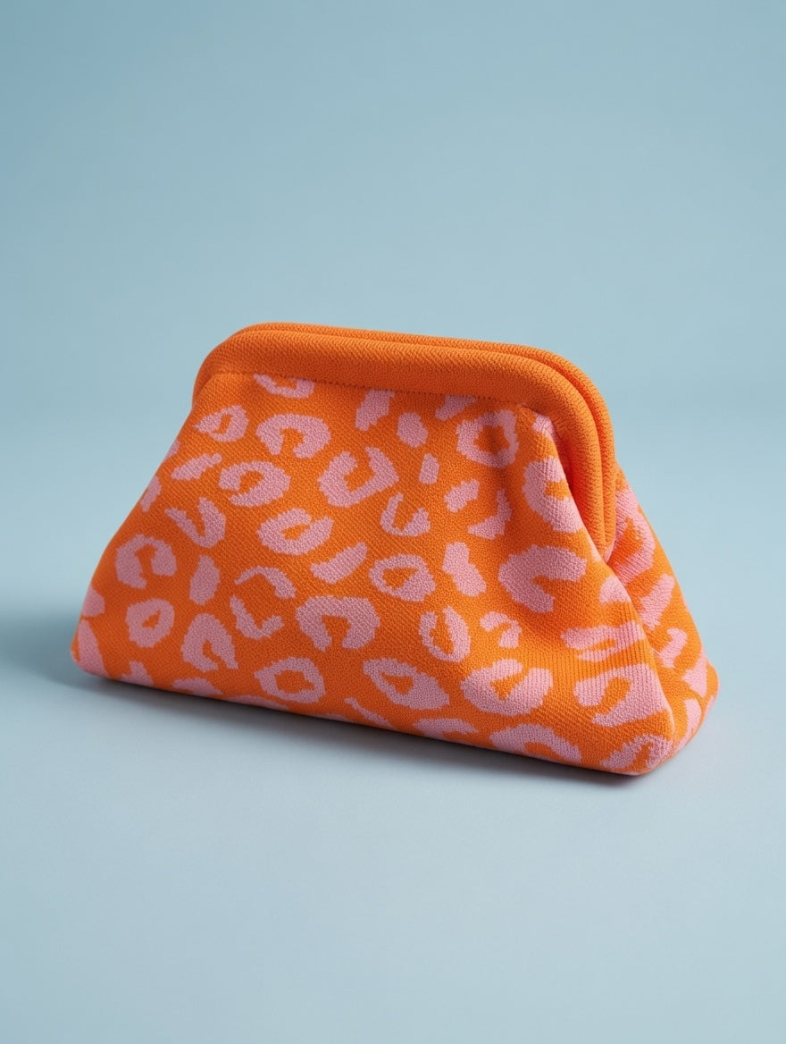 moderne Clutch Leo orange/rosa vom Hamburger Modelabel stegmann mode