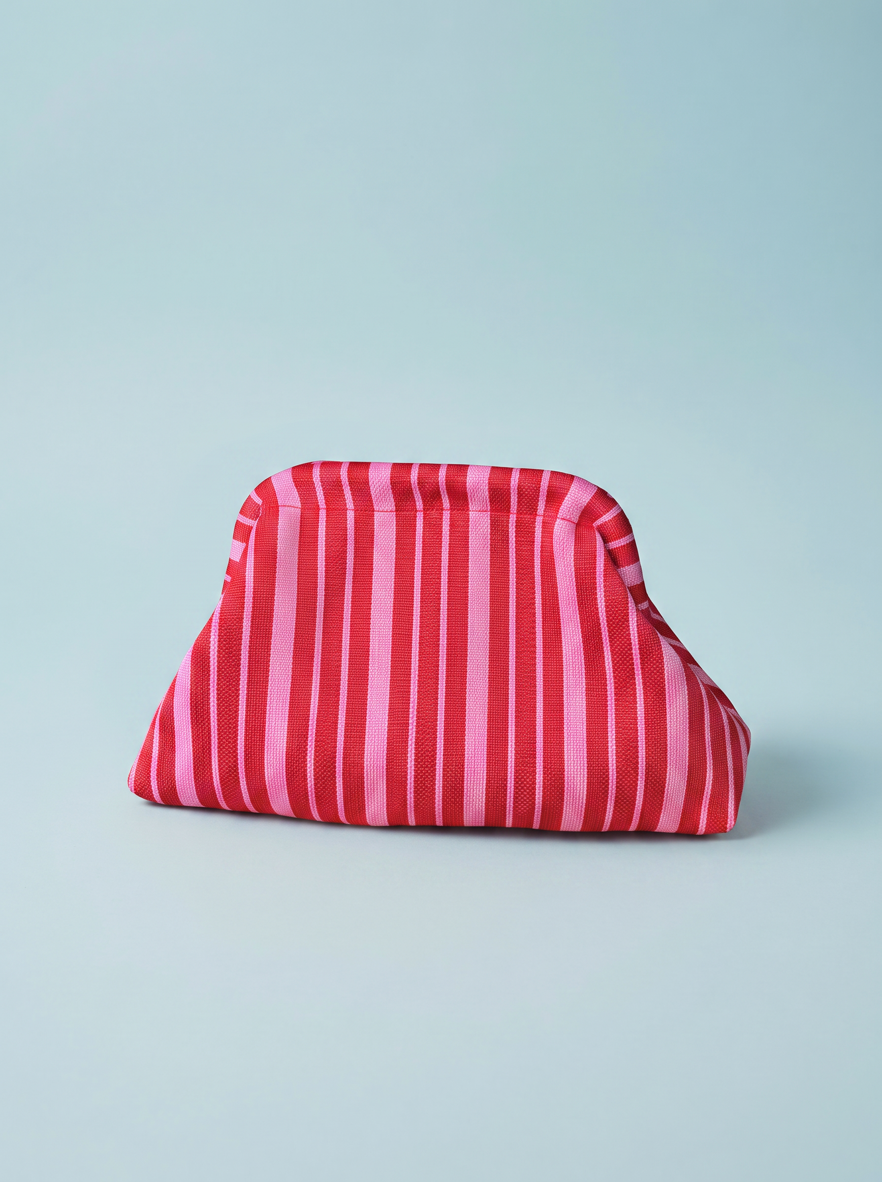 moderne Clutch Streifen rot/pink vom Hamburger Modelabel stegmann mode