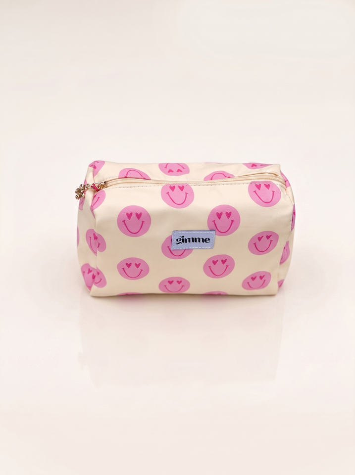 Produktfoto von Kosmetiktasche in der Farbe hellgelb mit rosa Smileys vom Hamburger Modelabel stegmann mode