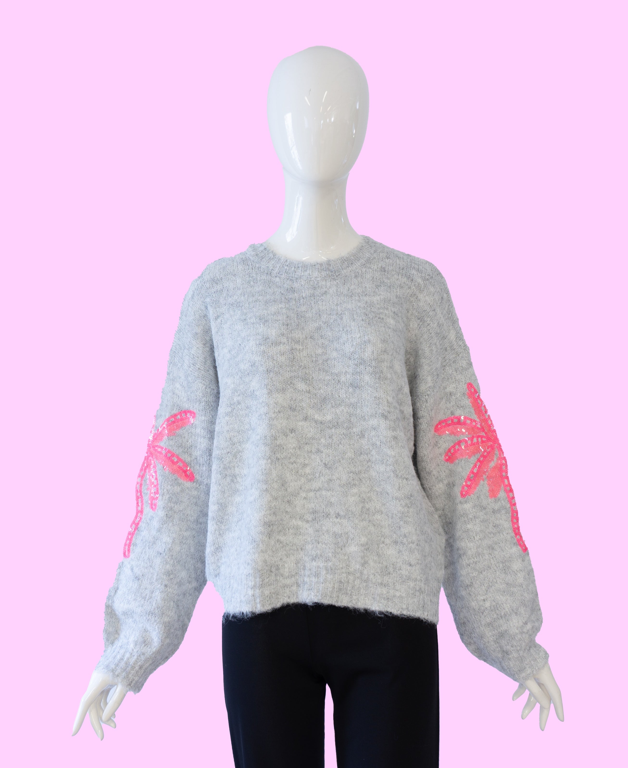 Strickpullover mit Palmen am Ärmel vom Hamburger Modelabel stegmann 