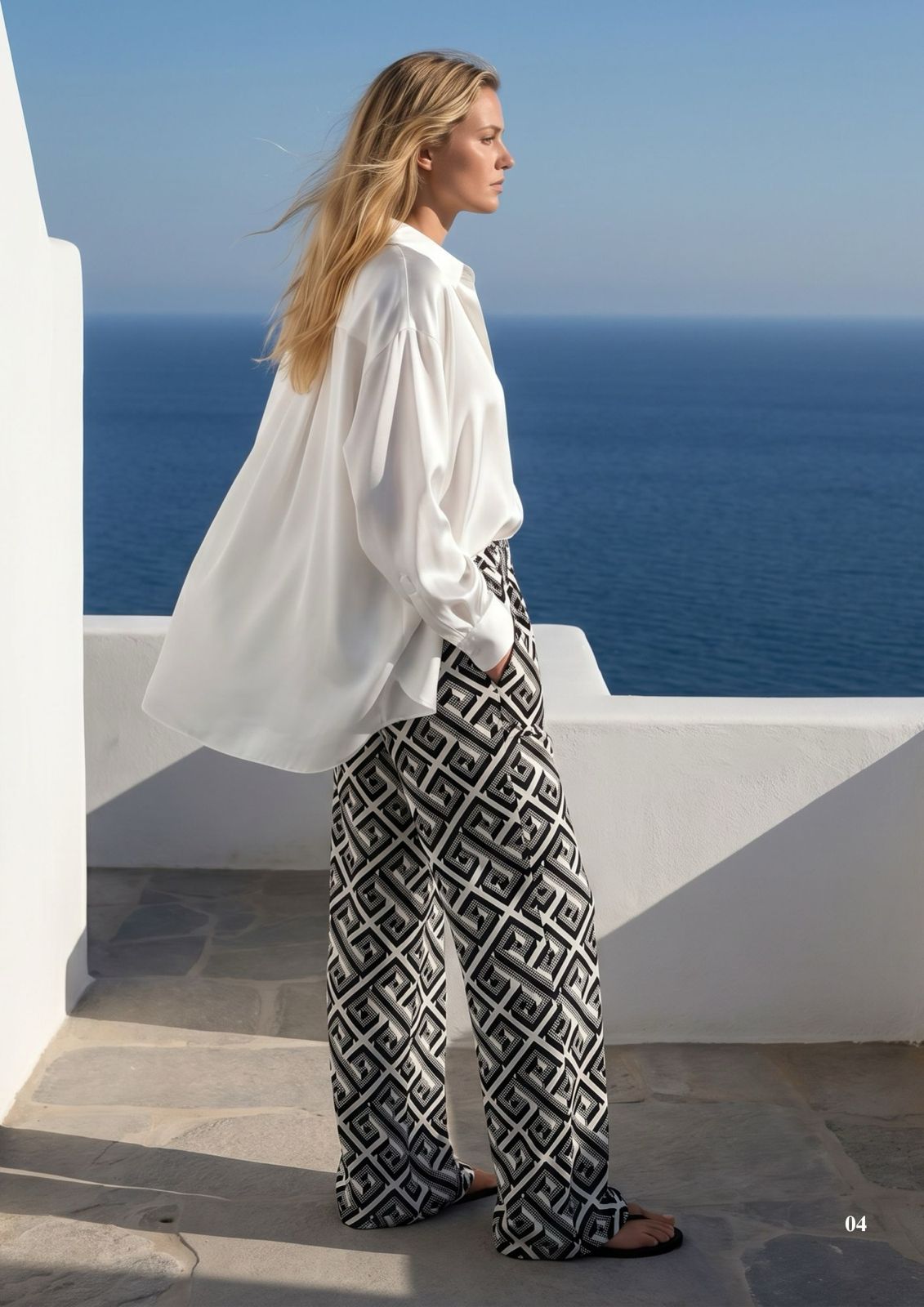 KI generiertes Modell auf Santorini in der Hose Twin im Print Dimension vom Hamburger Modelabel stegmann mode