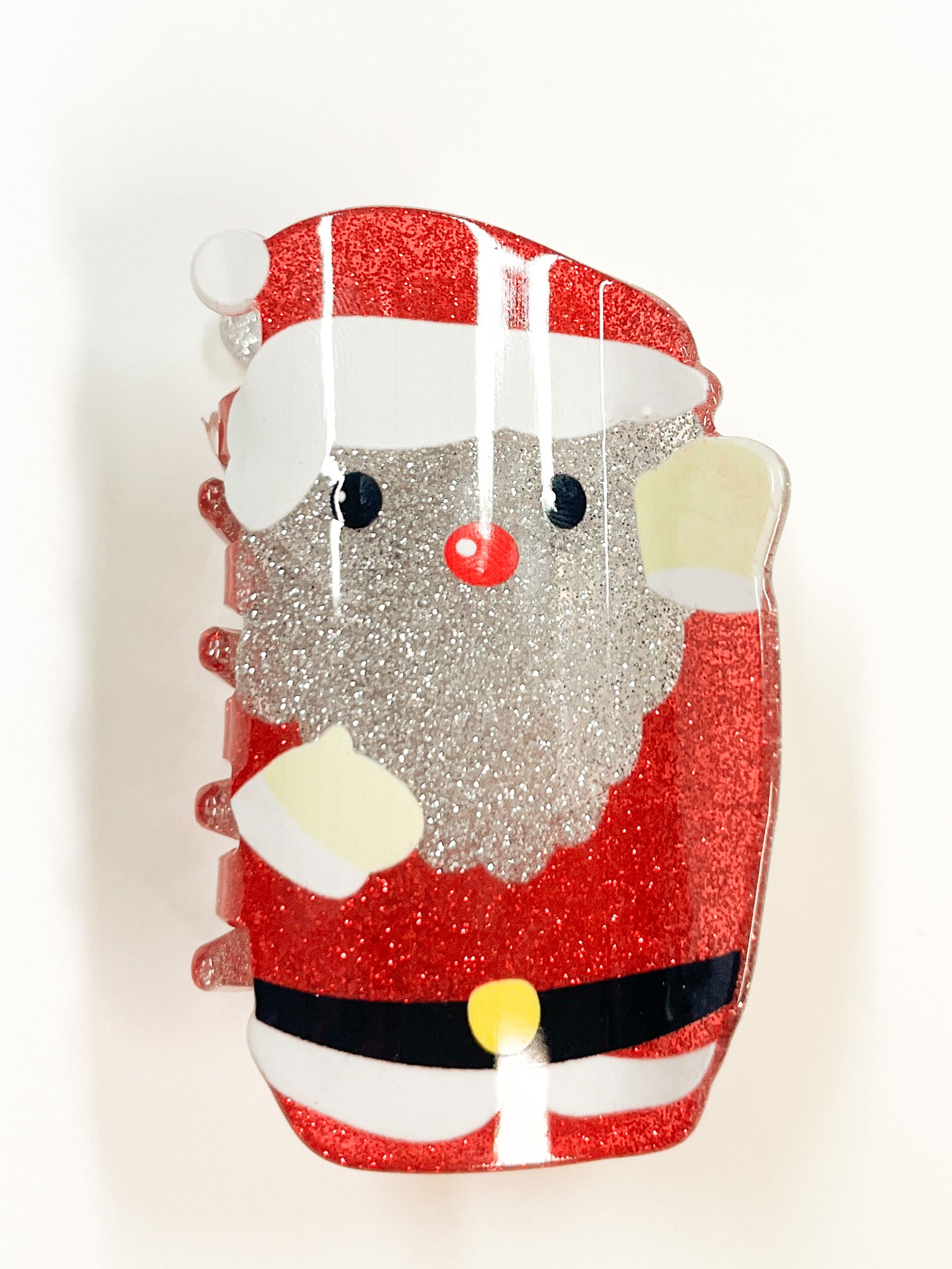 Produktfoto von Haarklemme in Weihnachtsmann Form von Hamburger Modelabel stegmann mode